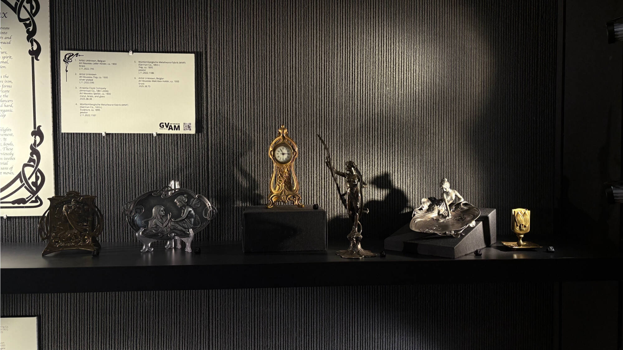 Interior of the case showcasing the exhibition, La Danse des Métaux